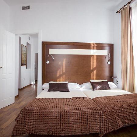 Apartamentos Casa De La Lonja غرناطة الغرفة الصورة